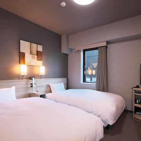 Hotel Route-Inn Toyama Ekimae Екстериор снимка
