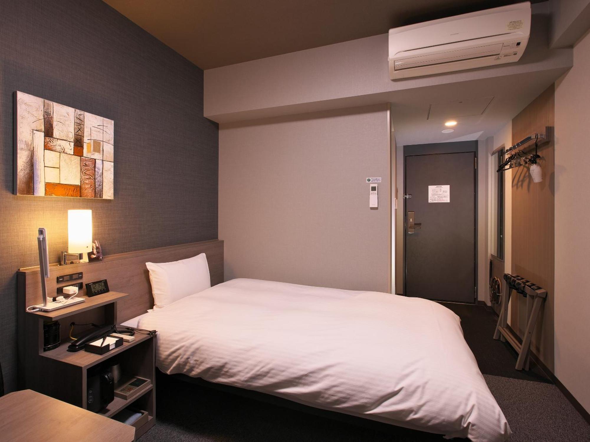 Hotel Route-Inn Toyama Ekimae Екстериор снимка