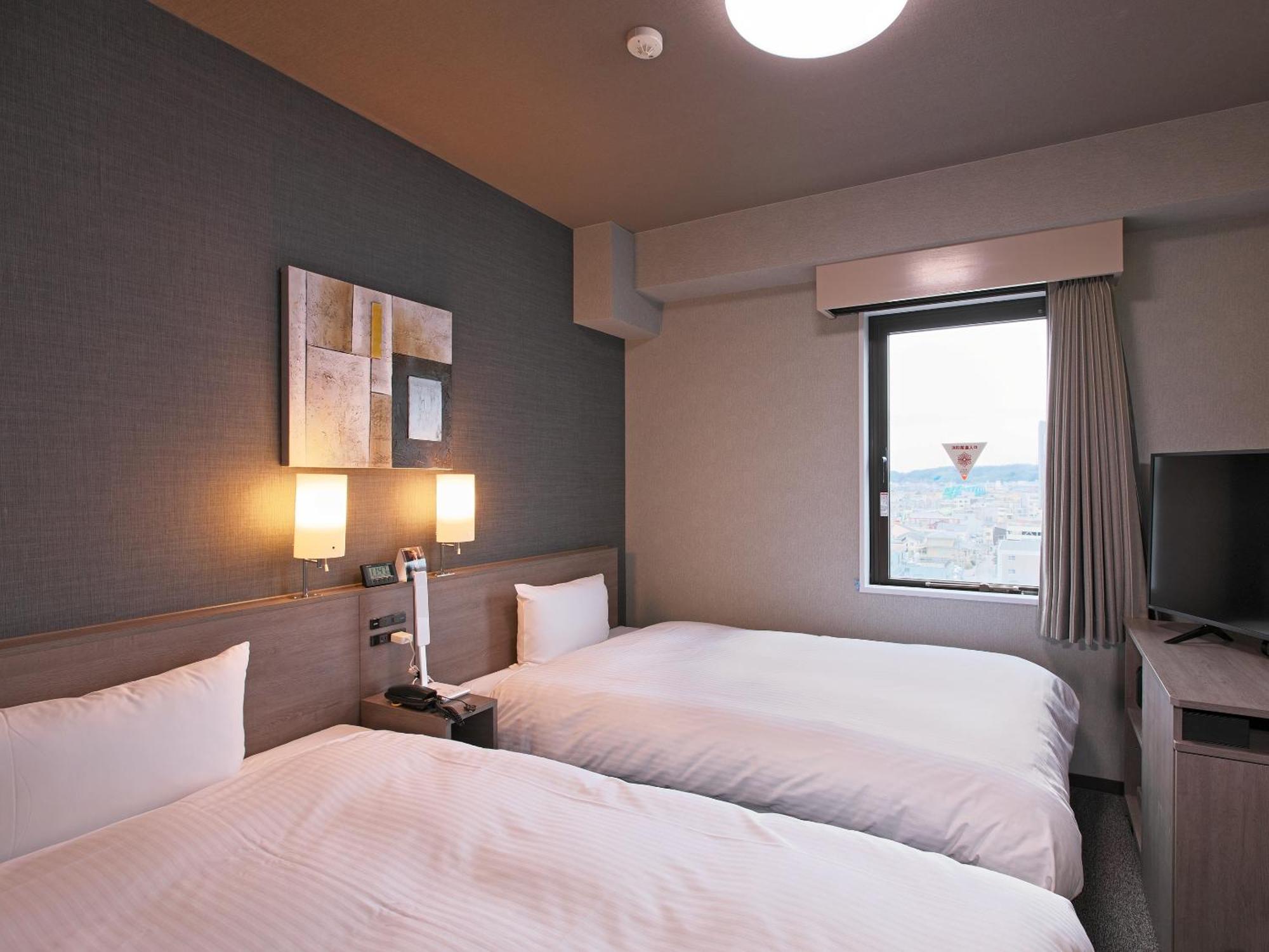 Hotel Route-Inn Toyama Ekimae Екстериор снимка