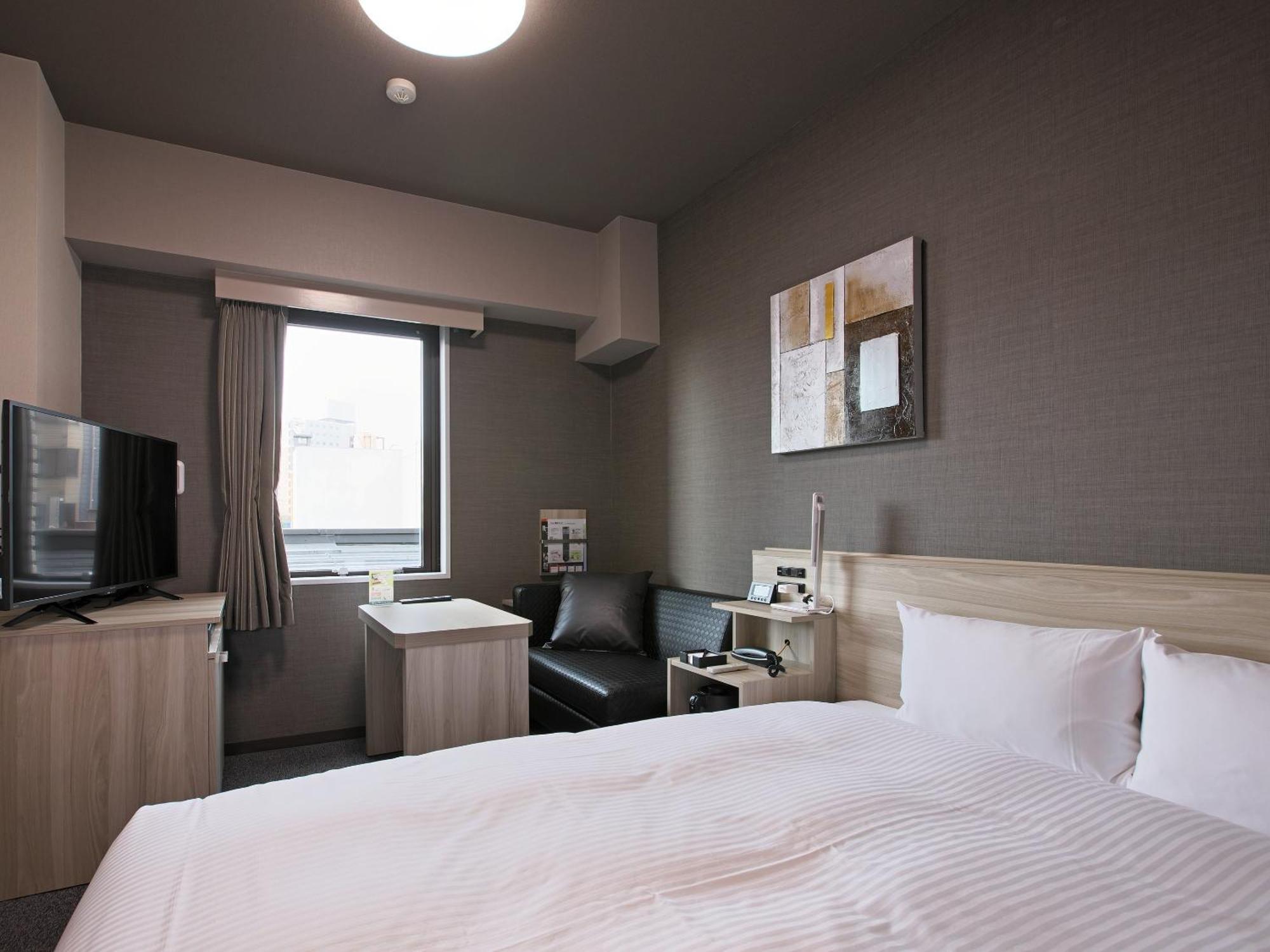 Hotel Route-Inn Toyama Ekimae Екстериор снимка